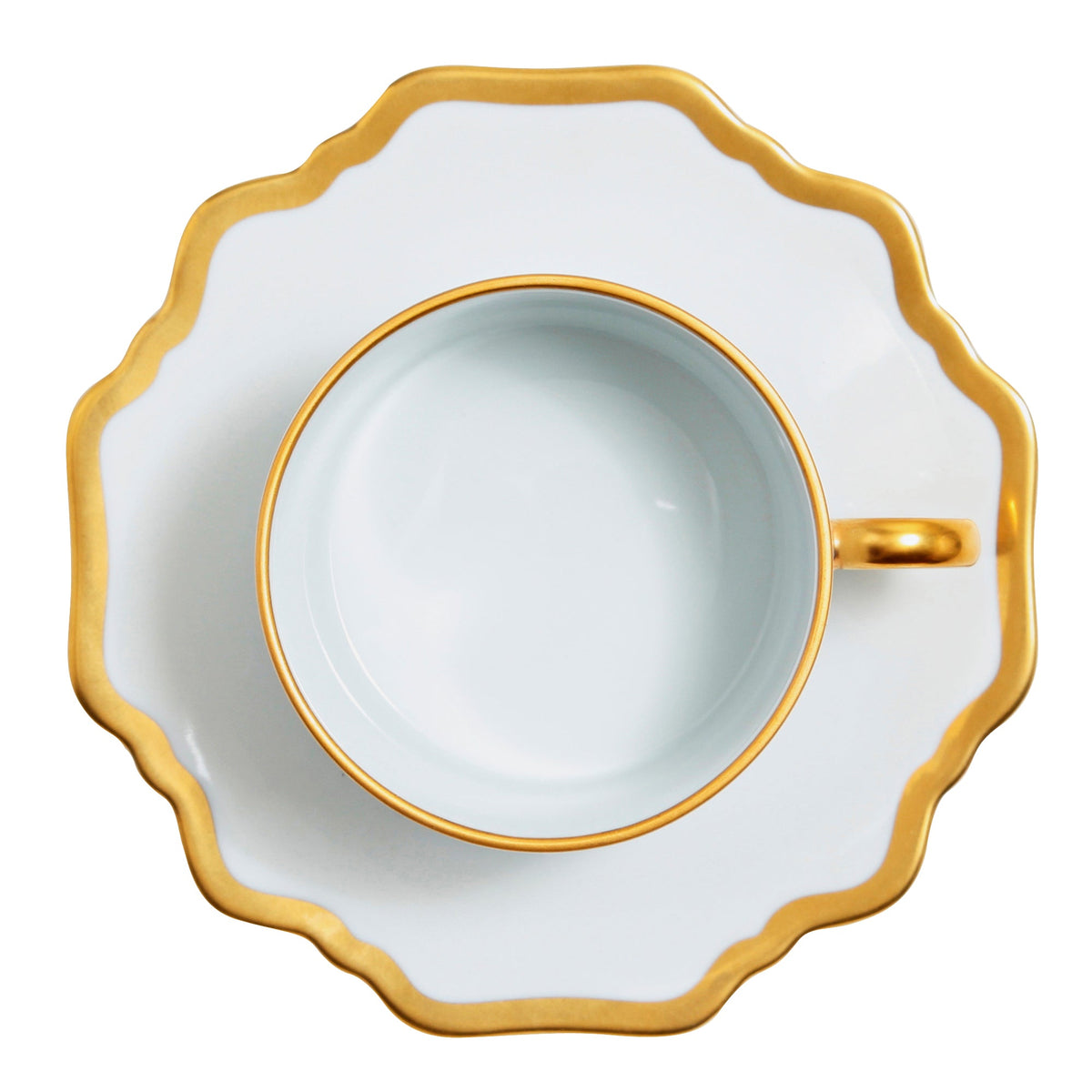 Antique White and Gold Tea Cup and Saucer